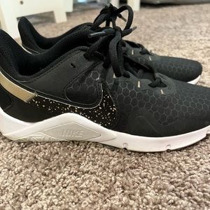 Black and gold Nike